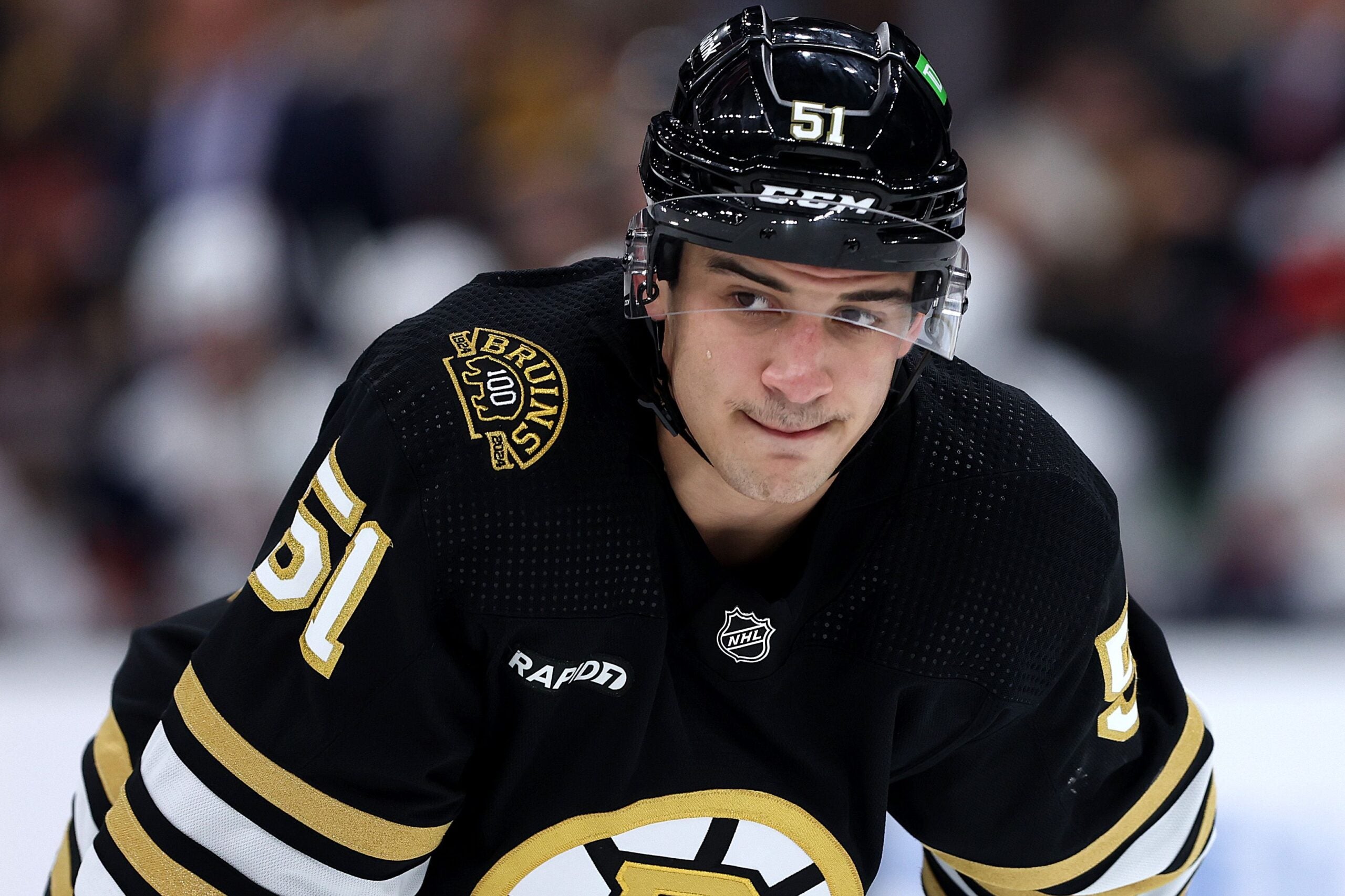 BOSTON, MASSACHUSETTS - OCTOBER 30: Matthew Poitras #51 of the Boston Bruins looks on during the second period against the Florida Panthers at TD Garden on October 30, 2023 in Boston, Massachusetts.