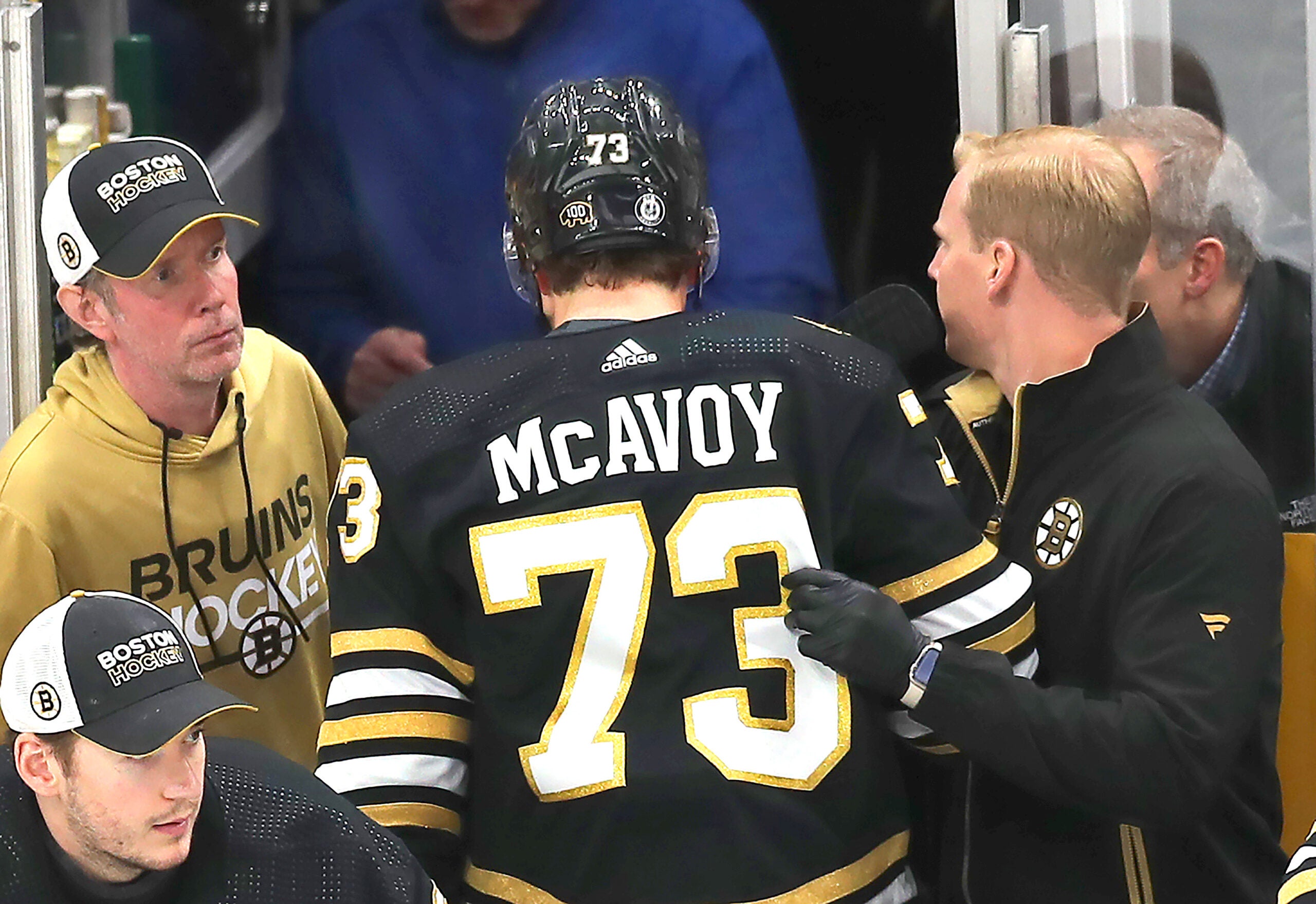 Boston Bruins defenseman Charlie McAvoy heads to the locker room after after a 3rd period collision with Sabres JJ Peterka. He left the game.