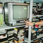 Whammy! founder Jessica Gonzales loads one of many VCR TVs at the used tape shop in Echo Park.